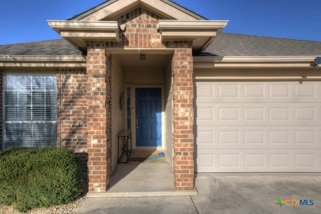 entrance to property with a garage