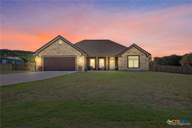 2656 Snow Rd, Kempner, TX 76539 - view of front of home featuring an attached garage, driveway, and stone siding