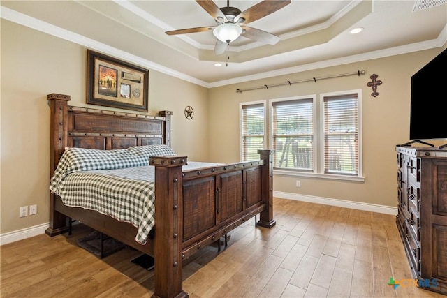 2656 Snow Rd, Kempner, TX 76539 - bedroom with a tray ceiling, light wood finished floors, baseboards, ornamental molding, and recessed lighting