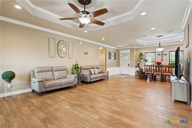 2656 Snow Rd, Kempner, TX 76539 - living area featuring a tray ceiling, a ceiling fan, light wood-type flooring, recessed lighting, and ornamental molding