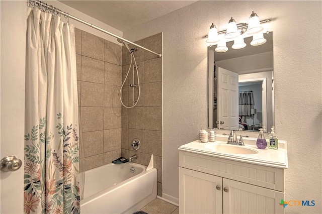 bathroom with vanity, shower / bath combination with curtain, and tile patterned floors