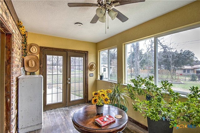 sunroom with a wealth of natural light and french doors