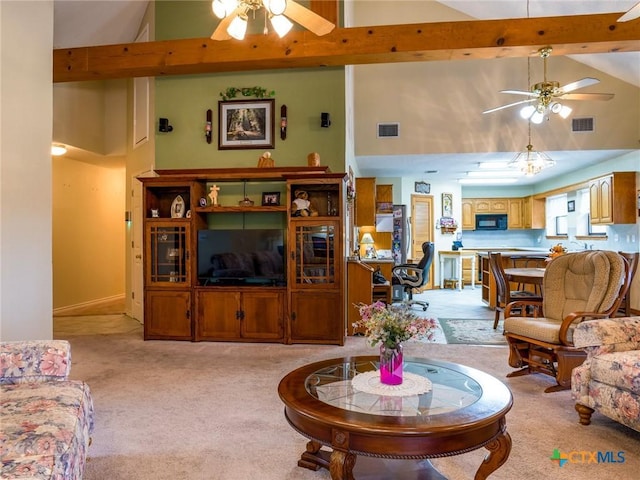 2904 Candace Cir, Horseshoe Bay, TX 78657 - living room featuring ceiling fan, high vaulted ceiling, and light carpet