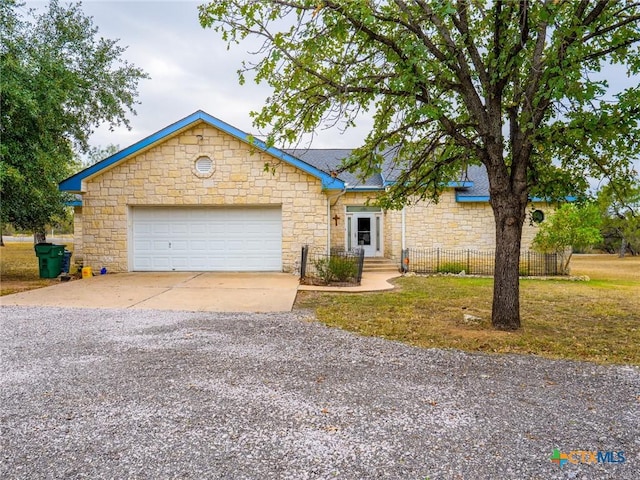2904 Candace Cir, Horseshoe Bay, TX 78657 - ranch-style house with stone siding, driveway, and an attached garage