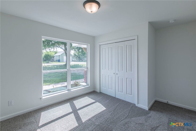 575 Live Oak Dr, Bertram, TX 78605 - unfurnished bedroom featuring carpet floors and a closet