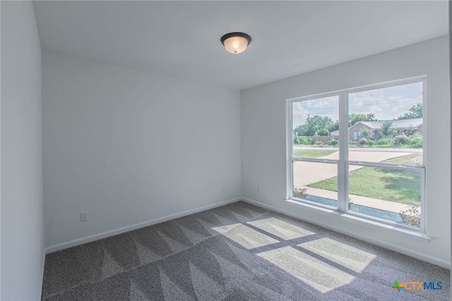 575 Live Oak Dr, Bertram, TX 78605 - carpeted empty room featuring healthy amount of natural light