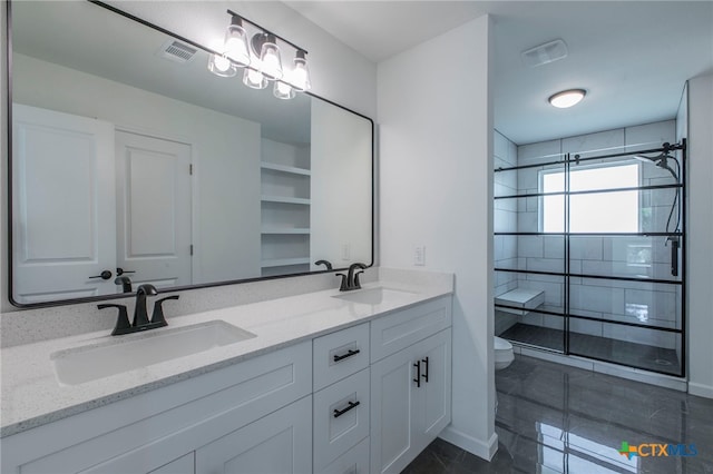 575 Live Oak Dr, Bertram, TX 78605 - bathroom featuring a shower stall and double vanity