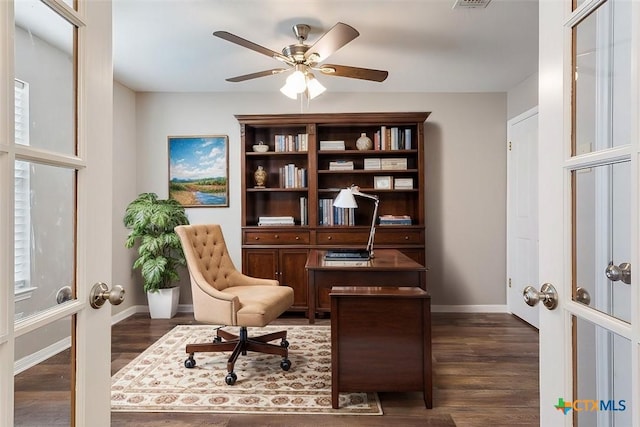 living area featuring french doors, dark wood-style floors, baseboards, visible vents, and ceiling fan