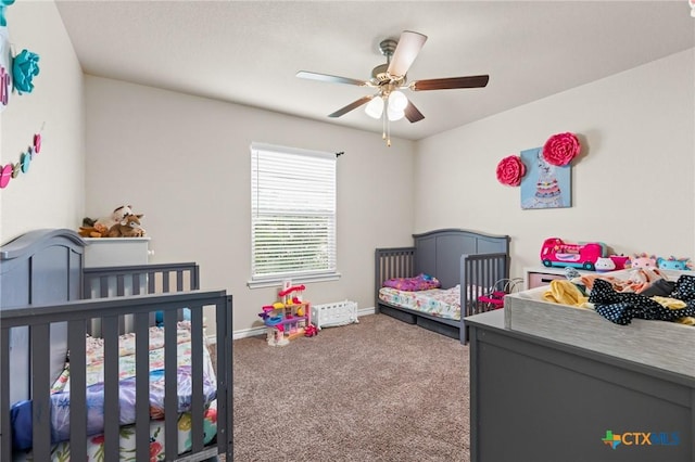 2635 Bolzano Trl, Temple, TX 76502 - carpeted bedroom featuring baseboards and ceiling fan