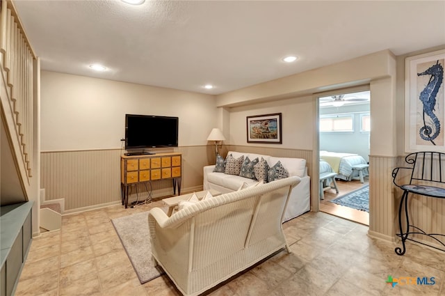 living room featuring ceiling fan