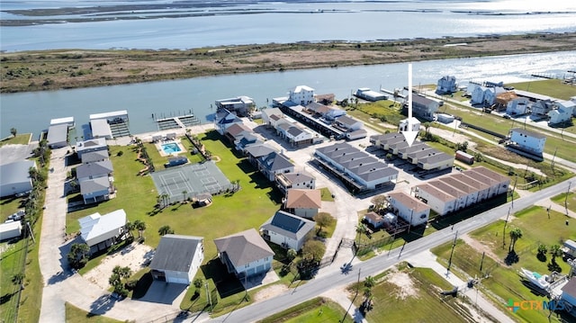 birds eye view of property featuring a water view