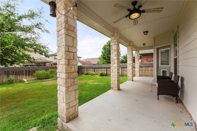 view of patio with ceiling fan