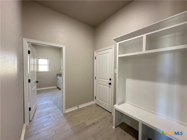 mudroom with light wood-type flooring