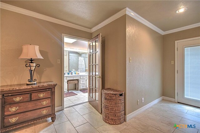 3618 Bobcat Trl, Temple, TX 76502 - foyer featuring ornamental molding, light tile patterned flooring, french doors, baseboards, and healthy amount of natural light