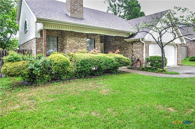 3618 Bobcat Trl, Temple, TX 76502 - view of front of property with brick siding, a garage, a chimney, and driveway