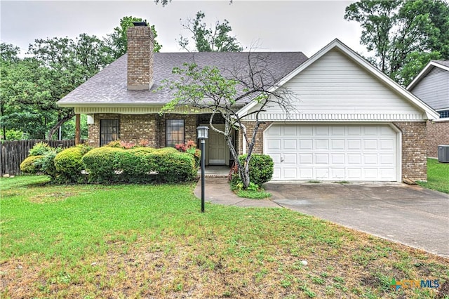 3618 Bobcat Trl, Temple, TX 76502 - view of front of property with brick siding, concrete driveway, an attached garage, a chimney, and central AC unit