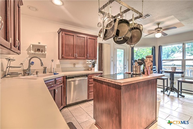 3618 Bobcat Trl, Temple, TX 76502 - kitchen featuring dishwasher, black electric cooktop, a sink, light tile patterned floors, and a ceiling fan