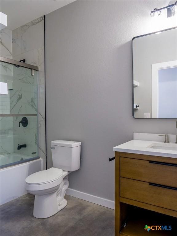 full bathroom with vanity, concrete flooring, shower / bath combination with glass door, and toilet