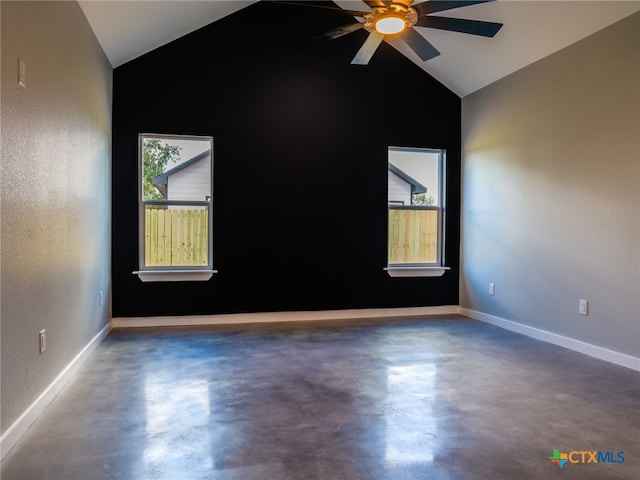 unfurnished room featuring vaulted ceiling and ceiling fan