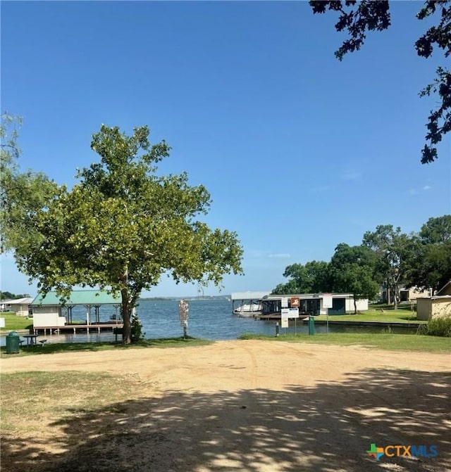 view of home's community with a water view