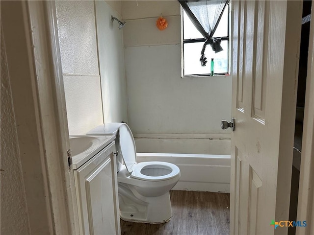 full bathroom featuring shower / bath combination, vanity, toilet, and wood-type flooring