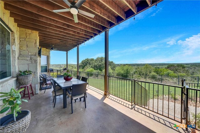 view of patio / terrace featuring ceiling fan