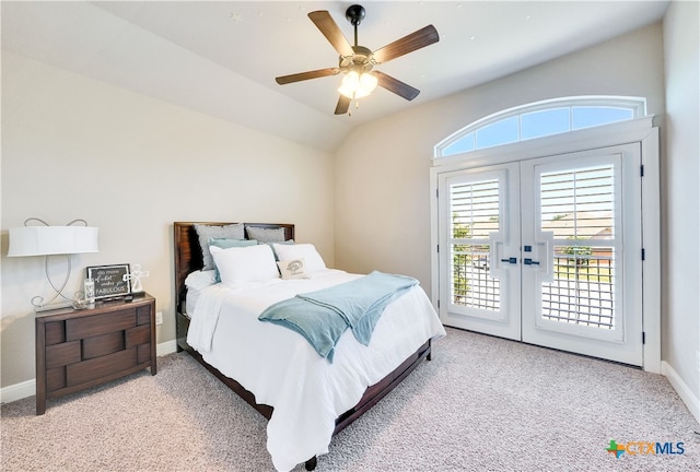 bedroom with access to outside, french doors, light carpet, lofted ceiling, and ceiling fan