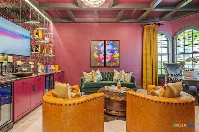 bar with wine cooler, coffered ceiling, light tile patterned floors, and beam ceiling