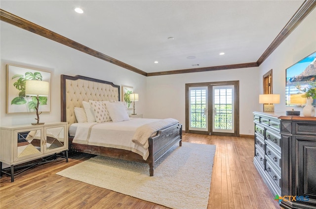 bedroom with french doors, hardwood / wood-style flooring, and crown molding