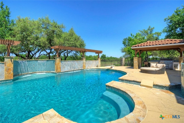 view of pool with a hot tub, a gazebo, grilling area, a patio, and pool water feature