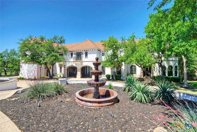 view of mediterranean / spanish-style house