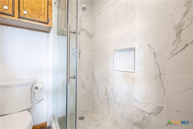 679 Royal Rd, Port Lavaca, TX 77979 - bathroom with a marble finish shower and toilet
