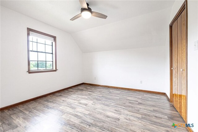 679 Royal Rd, Port Lavaca, TX 77979 - bonus room featuring light wood finished floors, vaulted ceiling, ceiling fan, and baseboards