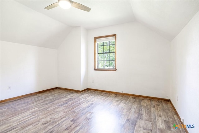 679 Royal Rd, Port Lavaca, TX 77979 - bonus room with wood finished floors, vaulted ceiling, a ceiling fan, and baseboards