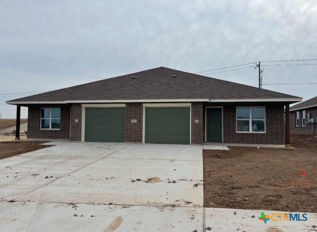 ranch-style house with a garage