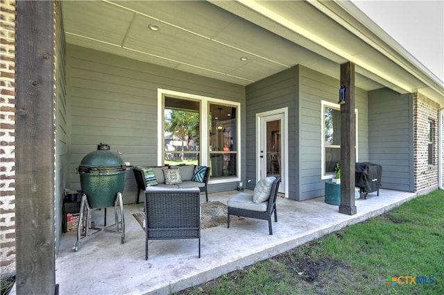 6129 Messina Dr, Temple, TX 76502 - view of patio with a grill and an outdoor hangout area