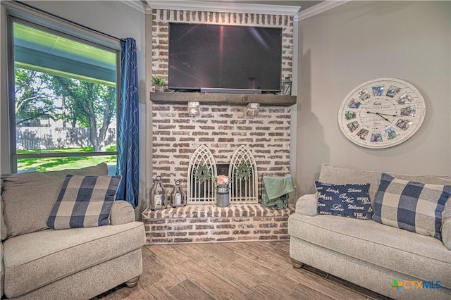 6129 Messina Dr, Temple, TX 76502 - living room featuring ornamental molding and wood tiled floors