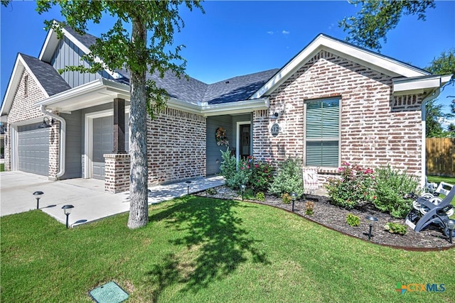 6129 Messina Dr, Temple, TX 76502 - single story home featuring board and batten siding, a garage, concrete driveway, brick siding, and a shingled roof
