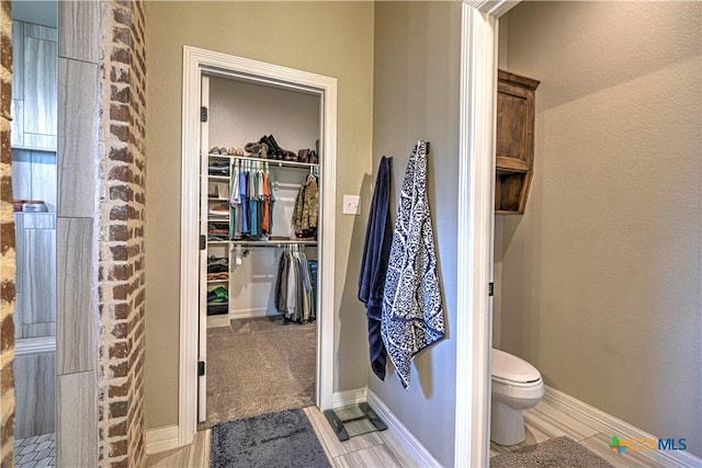 6129 Messina Dr, Temple, TX 76502 - bathroom with toilet and a walk in closet