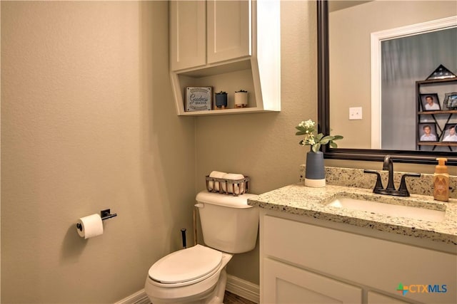 6129 Messina Dr, Temple, TX 76502 - half bathroom featuring vanity and toilet
