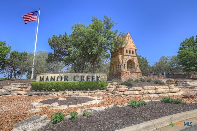 view of community sign
