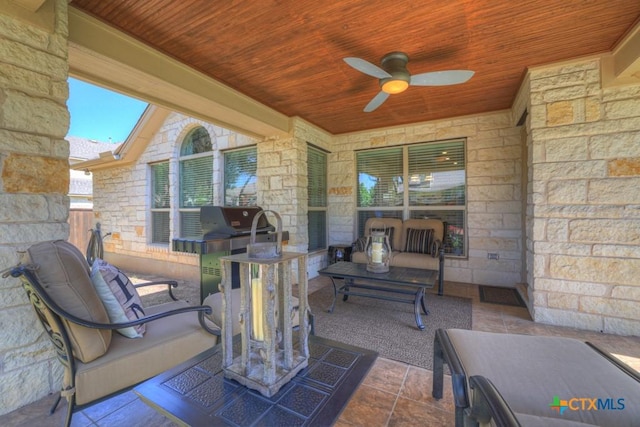 view of patio / terrace with a ceiling fan