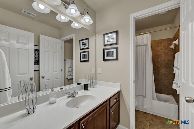 bathroom with vanity, shower / tub combo with curtain, tile patterned flooring, toilet, and visible vents