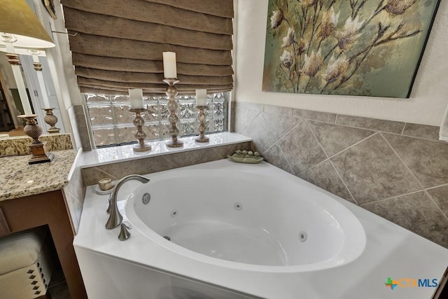 full bath featuring a tub with jets