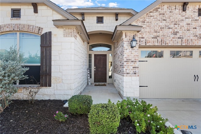 entrance to property with a garage