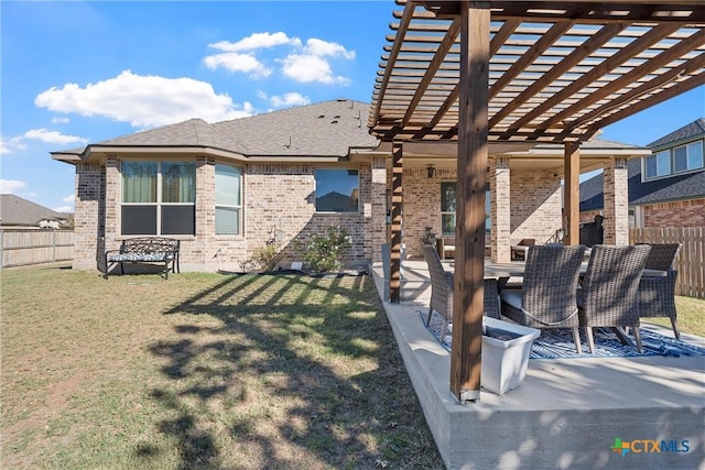 5502 Kent Dr, Belton, TX 76513 - fenced backyard with a pergola, a patio, and outdoor dining space