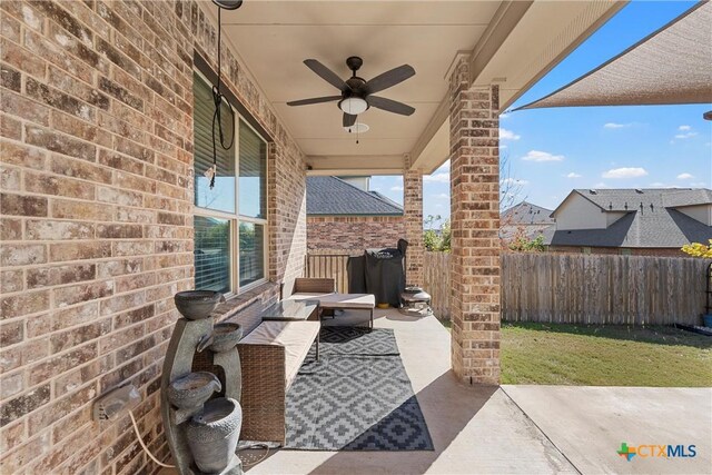 5502 Kent Dr, Belton, TX 76513 - fenced backyard featuring a ceiling fan and a patio