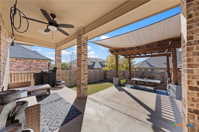 5502 Kent Dr, Belton, TX 76513 - fenced backyard with a patio, a ceiling fan, and outdoor dining area