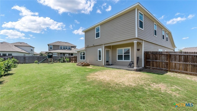 3608 Space Cloud Dr, New Braunfels, TX 78130 - rear view of house with a patio and a playground