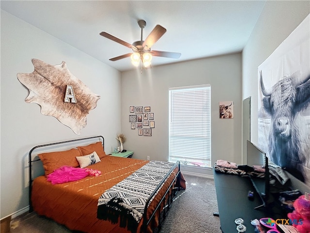 carpeted bedroom with ceiling fan